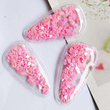 Glittering fun hair clips