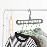 Space saving hangers holder
