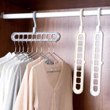 Space saving hangers holder