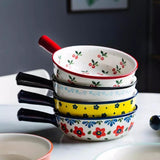 Ceramic bowl with handle