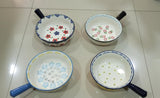 Ceramic bowl with handle